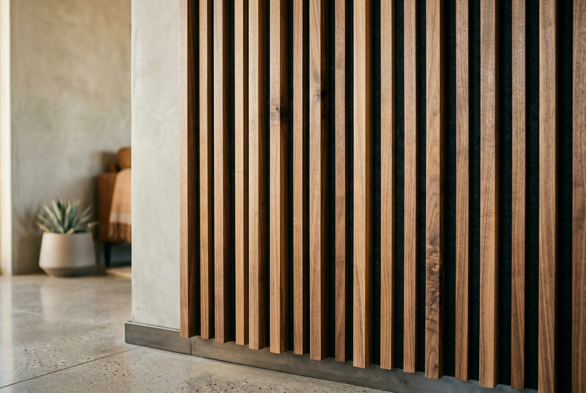 Decorative walnut wood slat acoustic diffuser panel on modern desert interior wall