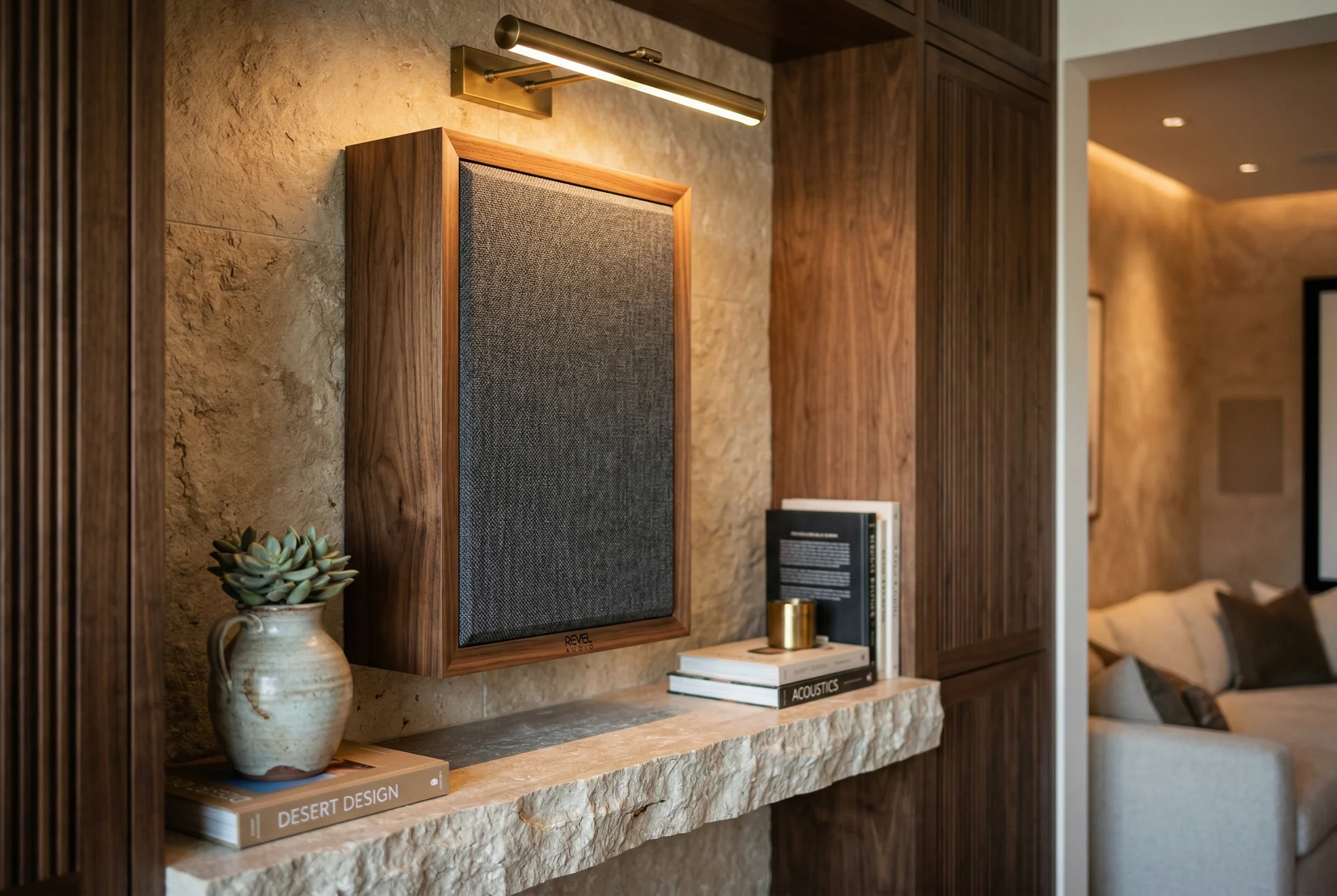 Custom walnut veneer on-wall speaker matching millwork in Silverleaf Scottsdale estate