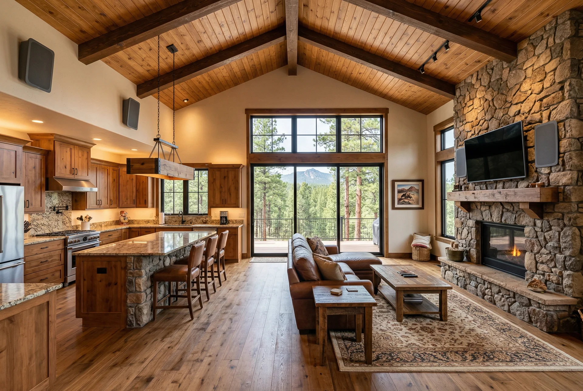 Open kitchen and living room with on-wall speakers in Prescott Arizona